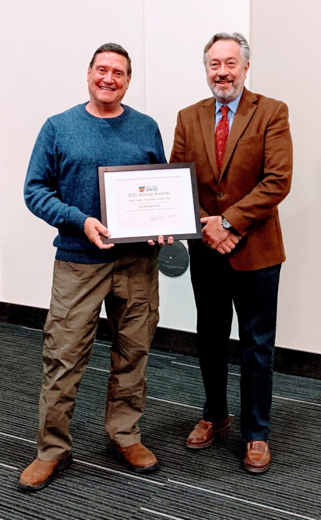 Photo of Scott Dommin, left.